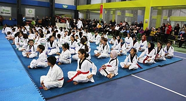 Meramlı sporcular kuşaklarını taktı