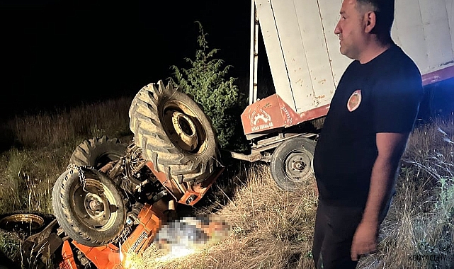 Devrilen traktörün altında can verdi