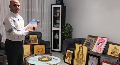 Güvenlik görevlisi çatı katını sanat atölyesine çevirdi   